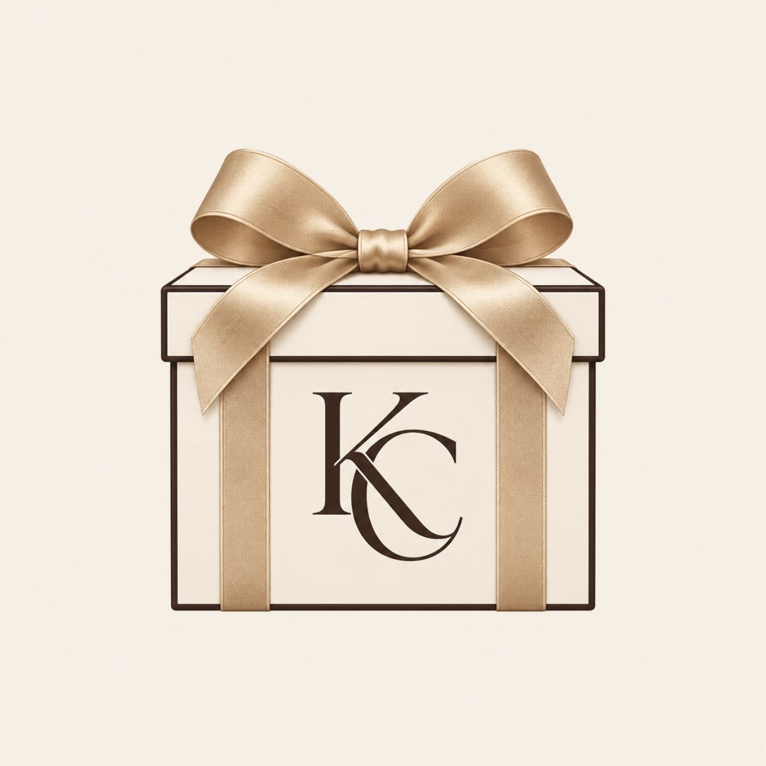 Kait C. Occasions branded corporate gift box with champagne ribbon and KC monogram